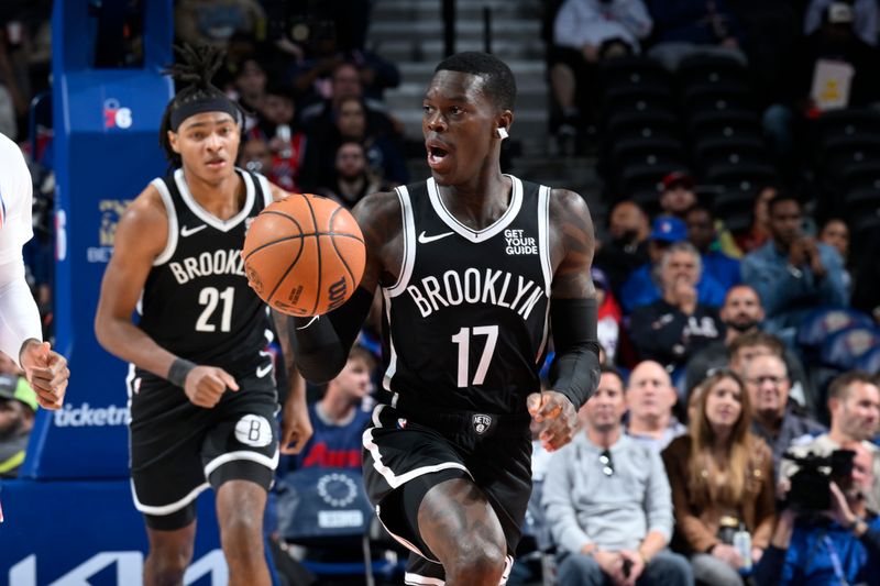 PHILADELPHIA, PA - OCTOBER 16:  Dennis Schroder #17 of the Brooklyn Nets dribbles the ball during the game against the Philadelphia 76ers on October 16, 2024 at the Wells Fargo Center in Philadelphia, Pennsylvania NOTE TO USER: User expressly acknowledges and agrees that, by downloading and/or using this Photograph, user is consenting to the terms and conditions of the Getty Images License Agreement. Mandatory Copyright Notice: Copyright 2024 NBAE (Photo by David Dow/NBAE via Getty Images)