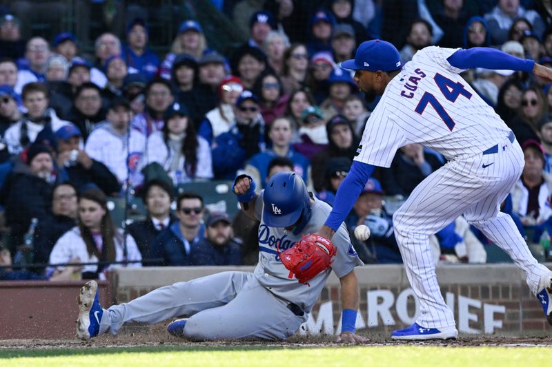 Apr 6, 2024; Chicago, Illinois, USA;  Los Angeles Dodgers catcher Austin Barnes (15) scores on a wild pitch past  Chicago Cubs pitcher Jose Cuas (74) during the fifth inning at Wrigley Field. Mandatory Credit: Matt Marton-USA TODAY Sports