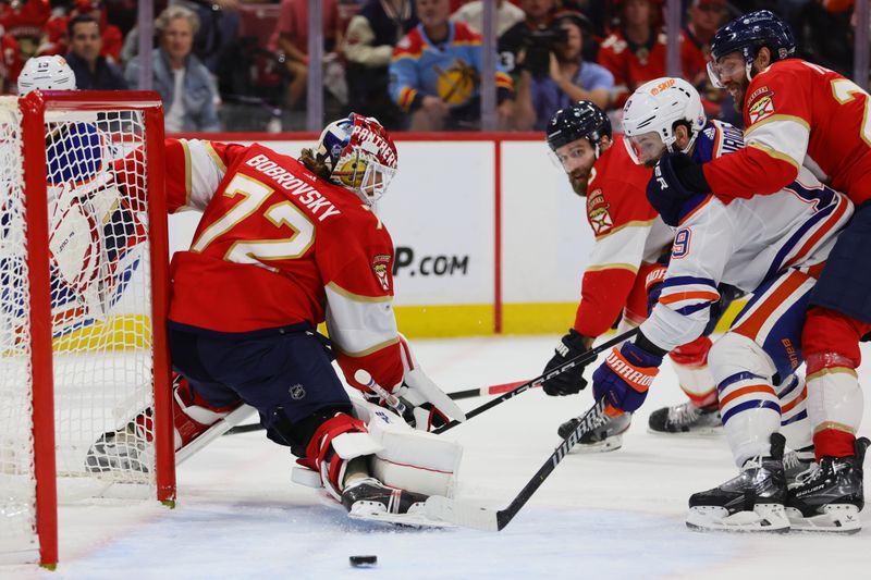 Jun 24, 2024; Sunrise, Florida, USA; Florida Panthers goaltender Sergei Bobrovsky (72) defends against dEdmonton Oilers forward Adam Henrique (19) during the first period in game seven of the 2024 Stanley Cup Final at Amerant Bank Arena. Mandatory Credit: Sam Navarro-USA TODAY Sports