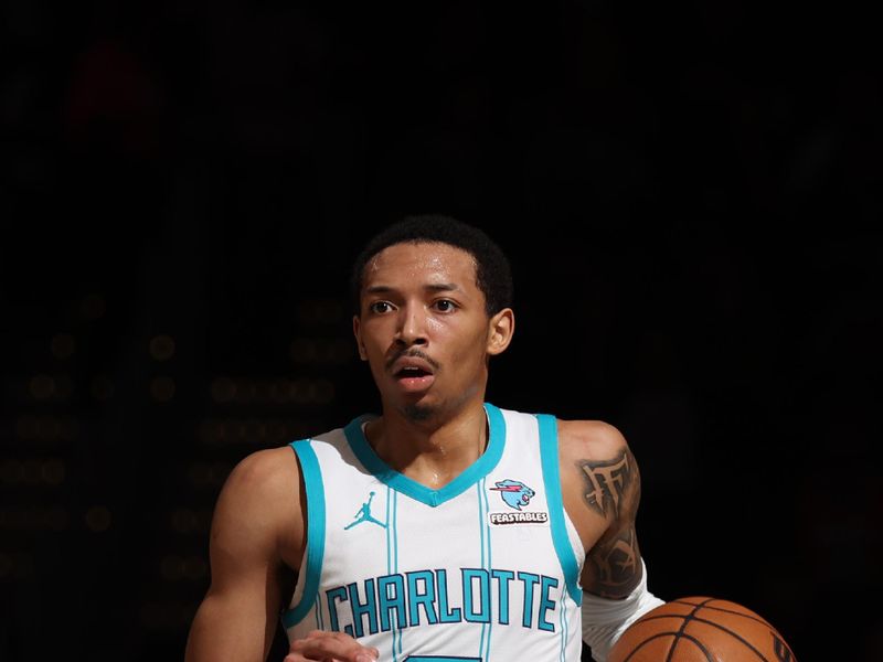 WASHINGTON, DC -? MARCH 8:  Nick Smith Jr. #8 of the Charlotte Hornets handles the ball during the game  on March 8, 2024 at Capital One Arena in Washington, DC. NOTE TO USER: User expressly acknowledges and agrees that, by downloading and or using this Photograph, user is consenting to the terms and conditions of the Getty Images License Agreement. Mandatory Copyright Notice: Copyright 2024 NBAE (Photo by Stephen Gosling/NBAE via Getty Images)