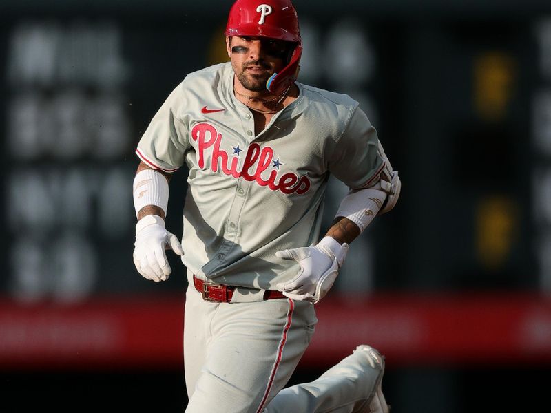 May 24, 2024; Denver, Colorado, USA; Philadelphia Phillies right fielder Nick Castellanos (8) rounds second on a solo home run in the fifth inning against the Colorado Rockies at Coors Field. Mandatory Credit: Isaiah J. Downing-USA TODAY Sports