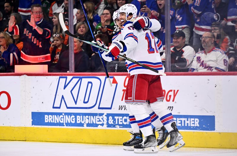 Nov 24, 2023; Philadelphia, Pennsylvania, USA; New York Rangers right wing Blake Wheeler (17) celebrates with left wing Chris Kreider (20) after scoring a goal against the Philadelphia Flyers in the first period at Wells Fargo Center. Mandatory Credit: Kyle Ross-USA TODAY Sports