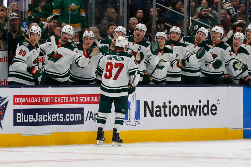 Oct 19, 2024; Columbus, Ohio, USA; Minnesota Wild left wing Kirill Kaprizov (97) celebrates his goal against the Columbus Blue Jackets during the third period  at Nationwide Arena. Mandatory Credit: Russell LaBounty-Imagn Images