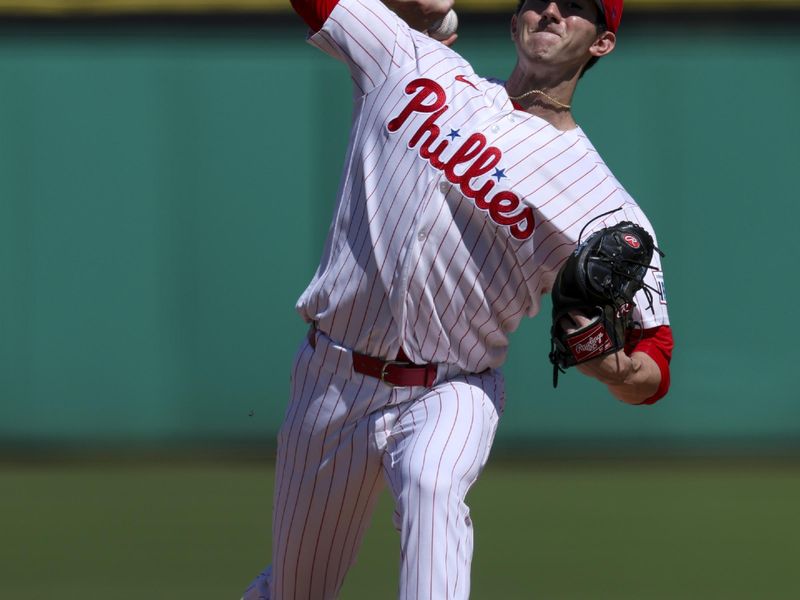 Mar 1, 2026; Clearwater, Florida, USA; Philadelphia Phillies starting pitcher Andrew Painter (76) throws a pitch against the New York Yankees in the second inning during spring training at BayCare Ballpark. Mandatory Credit: Nathan Ray Seebeck-Imagn Images
