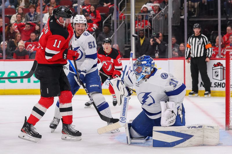 Dec 11, 2025; Newark, New Jersey, USA; Tampa Bay Lightning goaltender Jonas Johansson (31) makes a save against the New Jersey Devils during the second period at Prudential Center. Mandatory Credit: Ed Mulholland-Imagn Images