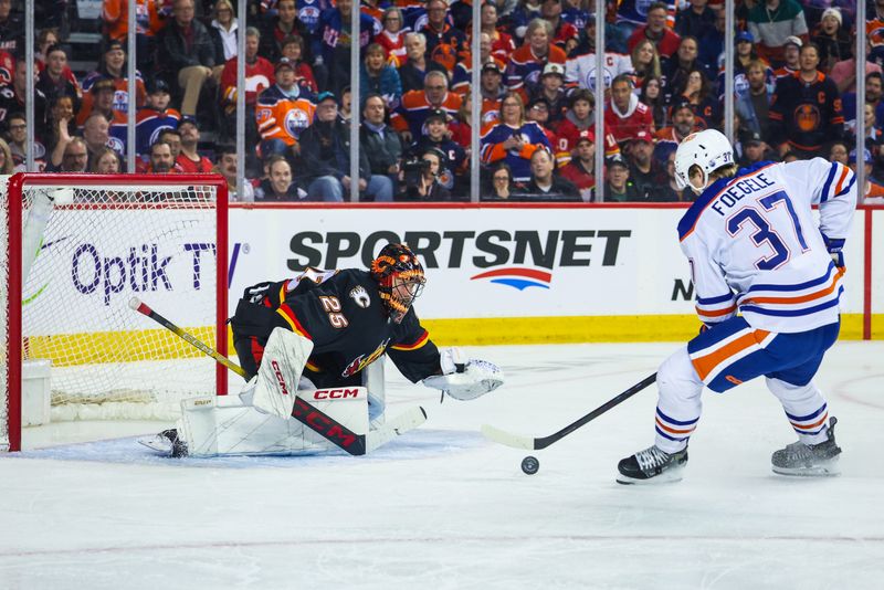 Apr 6, 2024; Calgary, Alberta, CAN; Calgary Flames goaltender Jacob Markstrom (25) makes a save against Edmonton Oilers left wing Warren Foegele (37) during the first period at Scotiabank Saddledome. Mandatory Credit: Sergei Belski-USA TODAY Sports