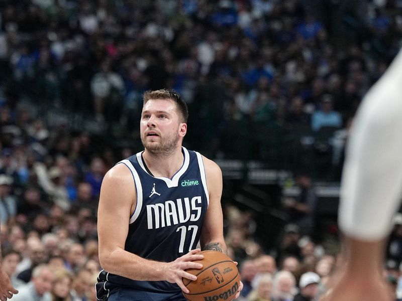 DALLAS, TX - NOVEMBER 8: Luka Doncic #77 of the Dallas Mavericks looks to pass the ball during the game against the Phoenix Suns on November 6, 2024 at the American Airlines Center in Dallas, Texas. NOTE TO USER: User expressly acknowledges and agrees that, by downloading and or using this photograph, User is consenting to the terms and conditions of the Getty Images License Agreement. Mandatory Copyright Notice: Copyright 2024 NBAE (Photo by Glenn James/NBAE via Getty Images)