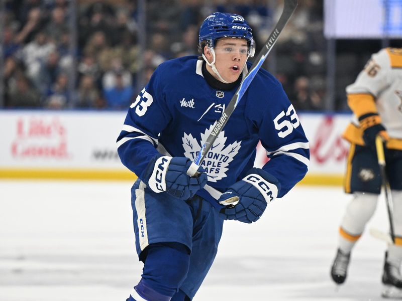 Oct 14, 2025; Toronto, Ontario, CAN;  Toronto Maple Leafs forward Easton Cowan (53) pursues the play against the Nashville Predators in the first period at Scotiabank Arena. Mandatory Credit: Dan Hamilton-Imagn Images
