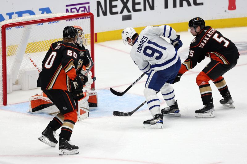 Jan 3, 2024; Anaheim, California, USA; Toronto Maple Leafs center John Tavares (91) scores a goal during the third period against the Anaheim Ducks at Honda Center. Mandatory Credit: Kiyoshi Mio-USA TODAY Sports