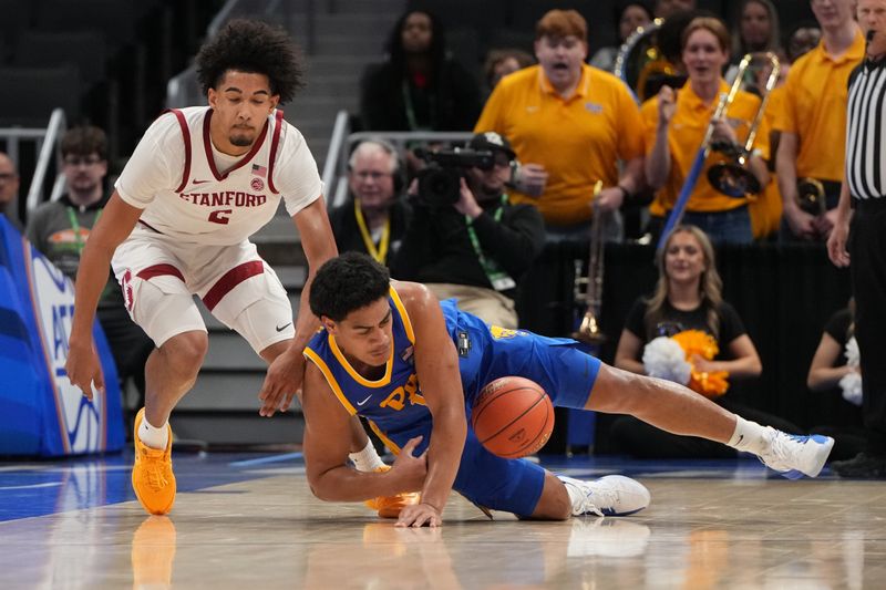 Mar 10, 2026; Charlotte, NC, USA; Stanford Cardinal forward Donavin Young (2) and Pittsburgh Panthers forward Roman Siulepa (13) fight for the ball in the first half at Spectrum Center. Mandatory Credit: Bob Donnan-Imagn Images