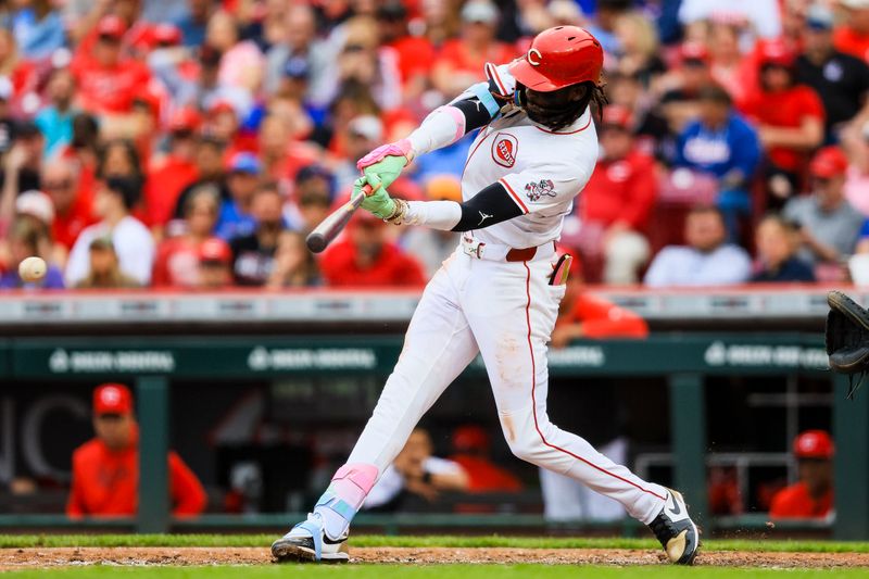 May 25, 2025; Cincinnati, Ohio, USA; Cincinnati Reds shortstop Elly De La Cruz (44) hits a RBI single in the fifth inning against the Chicago Cubs at Great American Ball Park. Mandatory Credit: Katie Stratman-Imagn Images
