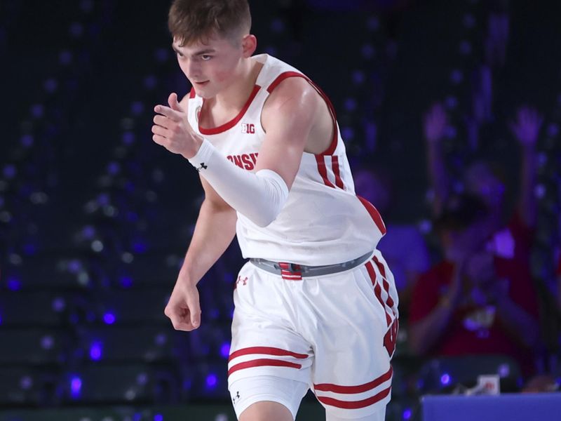 Nov 25, 2022; Paradise Island, BAHAMAS; Wisconsin Badgers guard Connor Essegian (3) reacts after scoring during the second half against the USC Trojans at Imperial Arena. Mandatory Credit: Kevin Jairaj-USA TODAY Sports