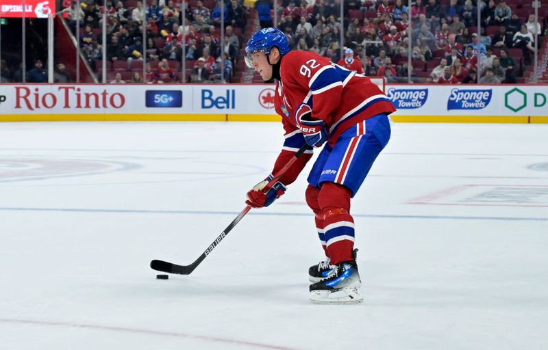 Sep 23, 2024; Montreal, Quebec, CAN; Montreal Canadiens forward Patrik Laine (92) plays the puck against the Philadelphia Flyers during the second period at the Bell Centre. Mandatory Credit: Eric Bolte-Imagn Images