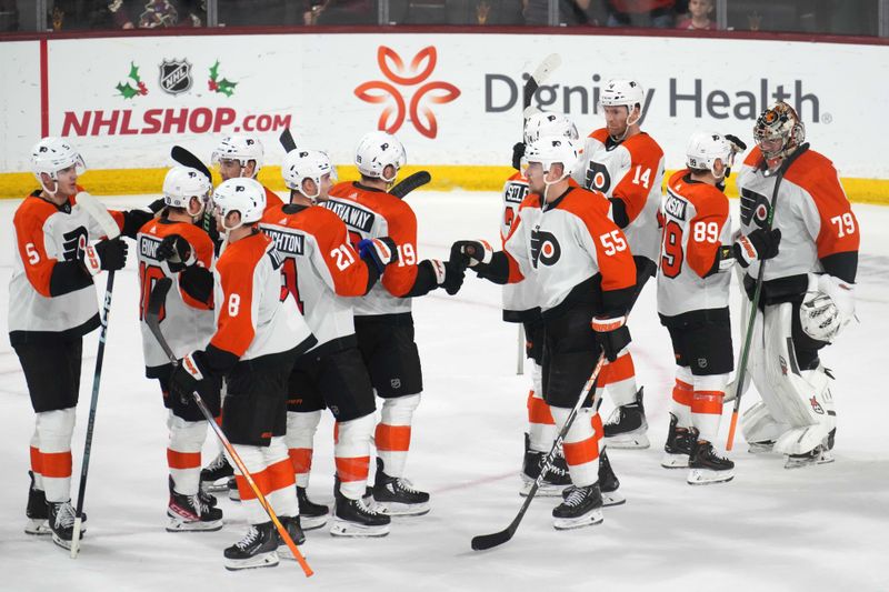 Dec 7, 2023; Tempe, Arizona, USA; Philadelphia Flyers celebrate after defeating the Arizona Coyotes at Mullett Arena. Mandatory Credit: Joe Camporeale-USA TODAY Sports