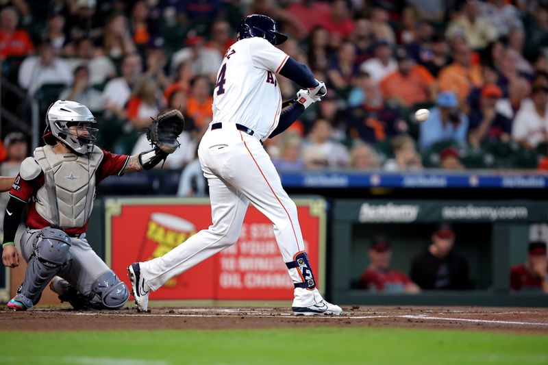 Sep 7, 2024; Houston, Texas, USA; Houston Astros left fielder Yordan Alvarez (44) hits a double against the Arizona Diamondbacks during the first inning at Minute Maid Park. Mandatory Credit: Erik Williams-Imagn Images