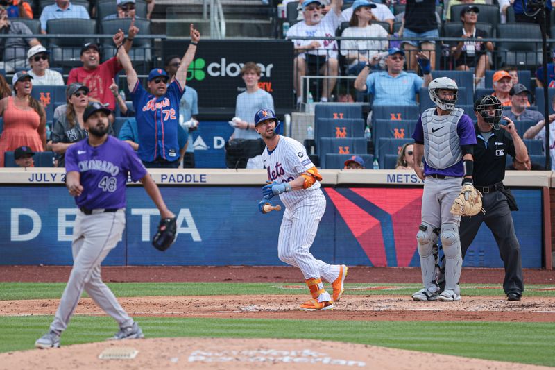 Jul 14, 2024; New York City, New York, USA; New York Mets first baseman Pete Alonso (20) looks up at his two run home run during the fourth inning in front of Colorado Rockies catcher Jacob Stallings (25) at Citi Field. Mandatory Credit: Vincent Carchietta-USA TODAY Sports