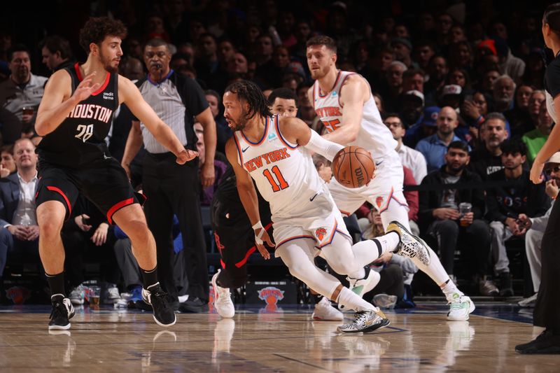 NEW YORK, NY - JANUARY 17: Jalen Brunson #11 of the New York Knicks dribbles the ball during the game against the Houston Rockets on January 17, 2024 at Madison Square Garden in New York City, New York.  NOTE TO USER: User expressly acknowledges and agrees that, by downloading and or using this photograph, User is consenting to the terms and conditions of the Getty Images License Agreement. Mandatory Copyright Notice: Copyright 2024 NBAE  (Photo by Nathaniel S. Butler/NBAE via Getty Images)