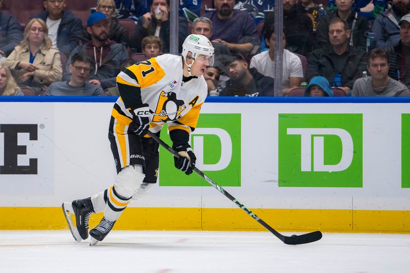 Oct 26, 2024; Vancouver, British Columbia, CAN; Pittsburgh Penguins forward Evgeni Malkin (71) handles the puck against the Vancouver Canucks during the second period at Rogers Arena. Mandatory Credit: Bob Frid-Imagn Images