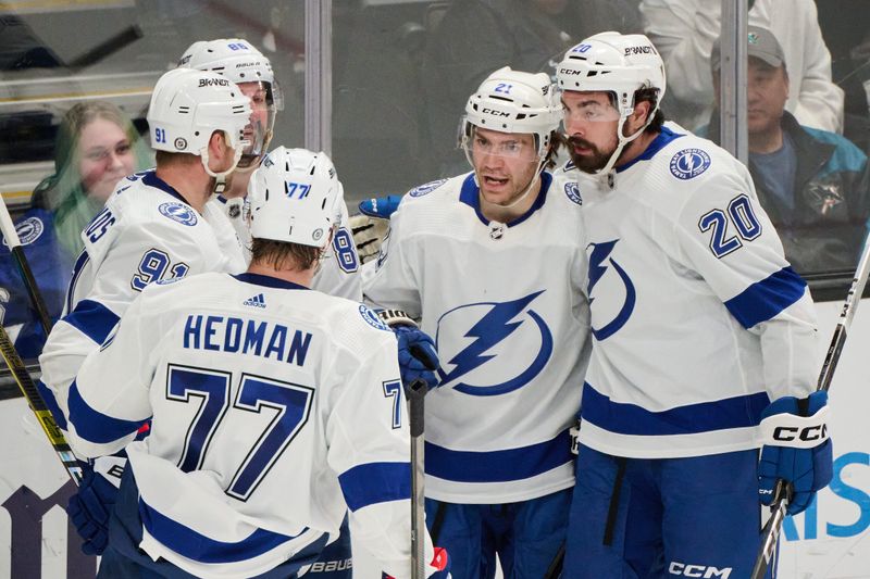 Mar 21, 2024; San Jose, California, USA; Tampa Bay Lightning left wing Nicholas Paul (20) celebrates with center Brayden Point (21) and his teammates after scoring a goal against the San Jose Sharks during the third period at SAP Center at San Jose. Mandatory Credit: Robert Edwards-USA TODAY Sports