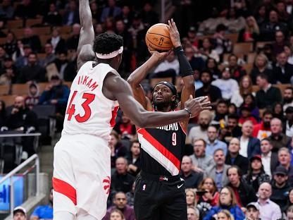 TORONTO, ON - OCTOBER 30: Jerami Grant #9 of the Portland Trail Blazers shoots against Pascal Siakam #43 of the Toronto Raptors during the first half of their basketball game at the Scotiabank Arena on October 30, 2023 in Toronto, Ontario, Canada. NOTE TO USER: User expressly acknowledges and agrees that, by downloading and/or using this Photograph, user is consenting to the terms and conditions of the Getty Images License Agreement. (Photo by Mark Blinch/Getty Images)