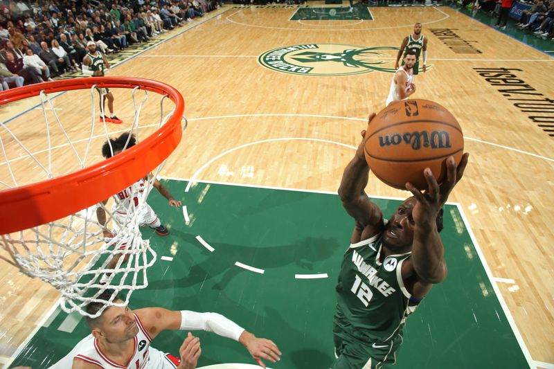 MILWAUKEE, WI - OCTOBER 25: Taurean Prince #12 of the Milwaukee Bucks drives to the basket during the game against the Chicago Bulls on October 25, 2024 at the Fiserv Forum Center in Milwaukee, Wisconsin. NOTE TO USER: User expressly acknowledges and agrees that, by downloading and or using this Photograph, user is consenting to the terms and conditions of the Getty Images License Agreement. Mandatory Copyright Notice: Copyright 2024 NBAE (Photo by Gary Dineen/NBAE via Getty Images).