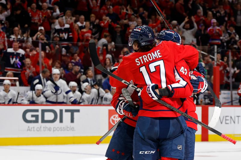 Mar 1, 2025; Washington, District of Columbia, USA; Washington Capitals left wing Alex Ovechkin (8) celebrates with teammates after scoring a goal against the Tampa Bay Lightning in the third period at Capital One Arena. Mandatory Credit: Geoff Burke-Imagn Images
