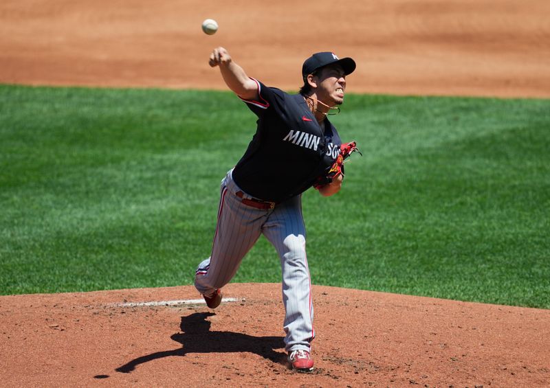 Jul 30, 2023; Kansas City, Missouri, USA; Minnesota Twins starting pitcher Kenta Maeda (18) pitches against the Kansas City Royals during the second inning at Kauffman Stadium. Mandatory Credit: Jay Biggerstaff-USA TODAY Sports