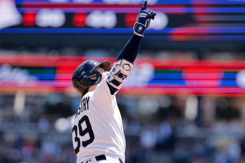 May 25, 2025; Detroit, Michigan, USA;  Detroit Tigers outfielder Zach McKinstry (39) celebrtes after hitting a two run home run in the fourth inning against the Cleveland Guardians at Comerica Park. Mandatory Credit: Rick Osentoski-Imagn Images