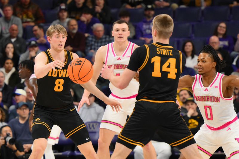 Feb 4, 2026; Seattle, Washington, USA; Iowa Hawkeyes forward Cooper Koch (8) passes the ball to guard Bennett Stirtz (14) during the first half against the Washington Huskies at Alaska Airlines Arena at Hec Edmundson Pavilion. Mandatory Credit: Steven Bisig-Imagn Images