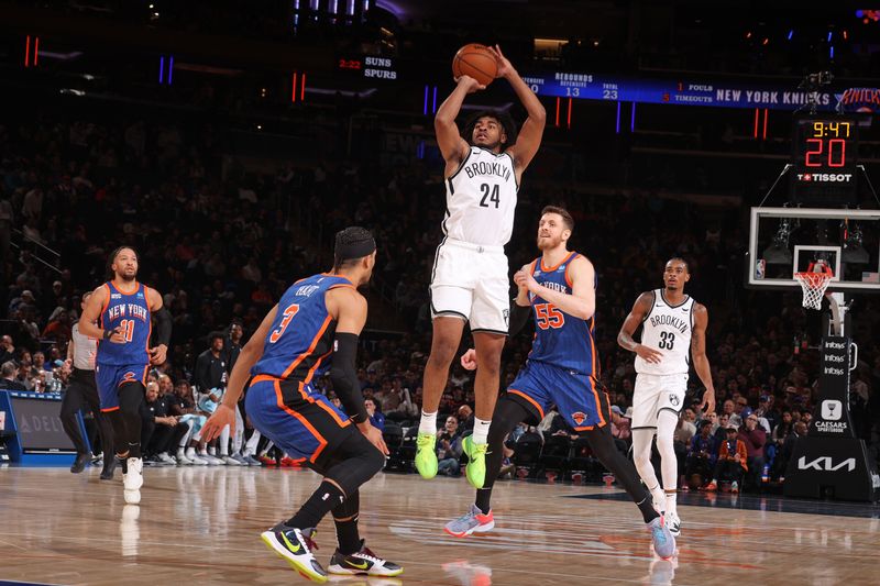 NEW YORK, NY - MARCH 23: Cam Thomas #24 of the Brooklyn Nets three point basket during the game against the New York Knicks on March 23, 2024 at Madison Square Garden in New York City, New York.  NOTE TO USER: User expressly acknowledges and agrees that, by downloading and or using this photograph, User is consenting to the terms and conditions of the Getty Images License Agreement. Mandatory Copyright Notice: Copyright 2024 NBAE  (Photo by Nathaniel S. Butler/NBAE via Getty Images)