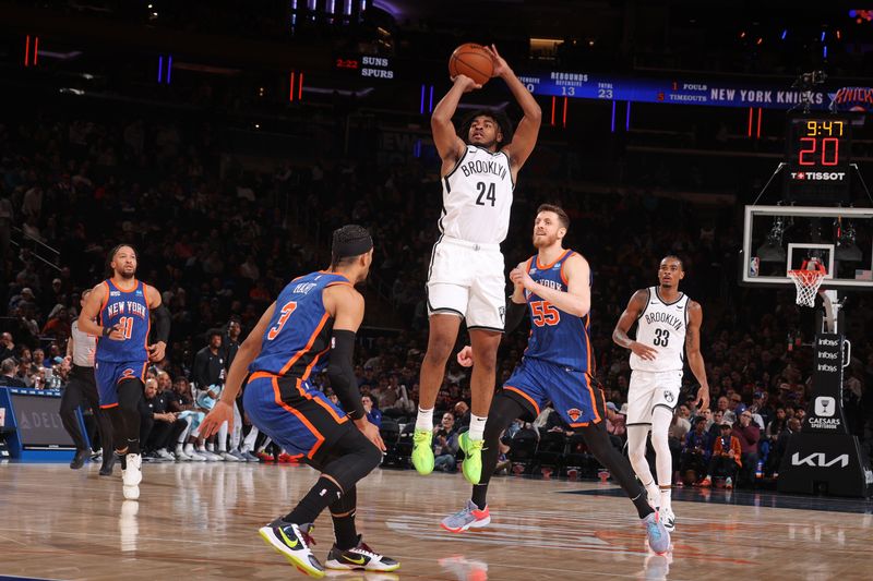 NEW YORK, NY - MARCH 23: Cam Thomas #24 of the Brooklyn Nets three point basket during the game against the New York Knicks on March 23, 2024 at Madison Square Garden in New York City, New York.  NOTE TO USER: User expressly acknowledges and agrees that, by downloading and or using this photograph, User is consenting to the terms and conditions of the Getty Images License Agreement. Mandatory Copyright Notice: Copyright 2024 NBAE  (Photo by Nathaniel S. Butler/NBAE via Getty Images)