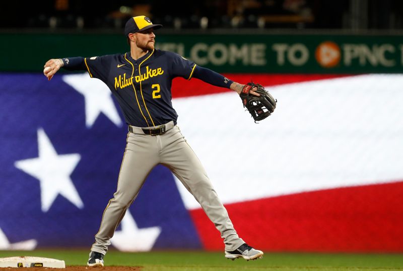 Sep 24, 2024; Pittsburgh, Pennsylvania, USA;  Milwaukee Brewers second baseman Brice Turang (2) warms up before the bottom of the third inning against the Pittsburgh Pirates at PNC Park. Mandatory Credit: Charles LeClaire-Imagn Images