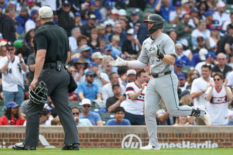 May 17, 2025; Chicago, Illinois, USA; Chicago White Sox first baseman Tim Elko (30) rounds the bases after hitting a solo home run against the Chicago Cubs during the fifth inning at Wrigley Field. Mandatory Credit: Kamil Krzaczynski-Imagn Images
