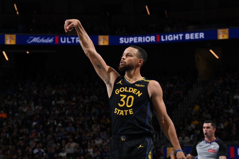 SAN FRANCISCO, CA - NOVEMBER 15: Stephen Curry #30 of the Golden State Warriors looks on during the game against the Memphis Grizzlies during the Emirates NBA Cup game on November 15, 2024 at Chase Center in San Francisco, California. NOTE TO USER: User expressly acknowledges and agrees that, by downloading and or using this photograph, user is consenting to the terms and conditions of Getty Images License Agreement. Mandatory Copyright Notice: Copyright 2024 NBAE (Photo by Noah Graham/NBAE via Getty Images)