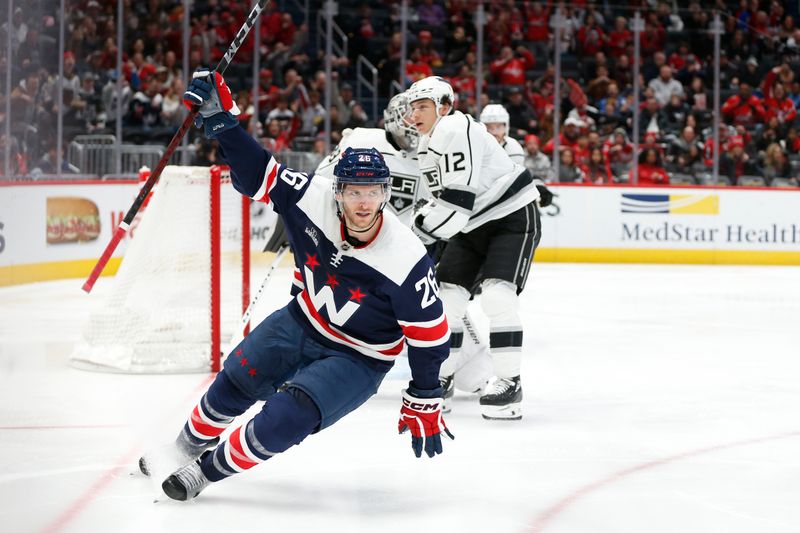 Jan 7, 2024; Washington, District of Columbia, USA; Washington Capitals right wing Nic Dowd (26) celebrates after scoring a goal past Los Angeles Kings goaltender Cam Talbot (39) during the second period at Capital One Arena. Mandatory Credit: Amber Searls-USA TODAY Sports