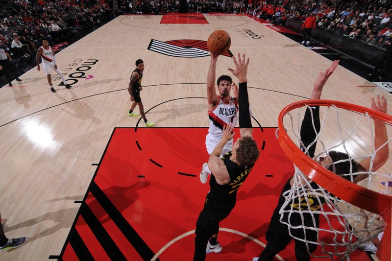 PORTLAND, OR - OCTOBER 18: Deni Avdija #8 of the Portland Trail Blazers drives to the basket during the game against the Utah Jazz on October 18, 2024 at the Moda Center Arena in Portland, Oregon. NOTE TO USER: User expressly acknowledges and agrees that, by downloading and or using this photograph, user is consenting to the terms and conditions of the Getty Images License Agreement. Mandatory Copyright Notice: Copyright 2024 NBAE (Photo by Cameron Browne/NBAE via Getty Images)