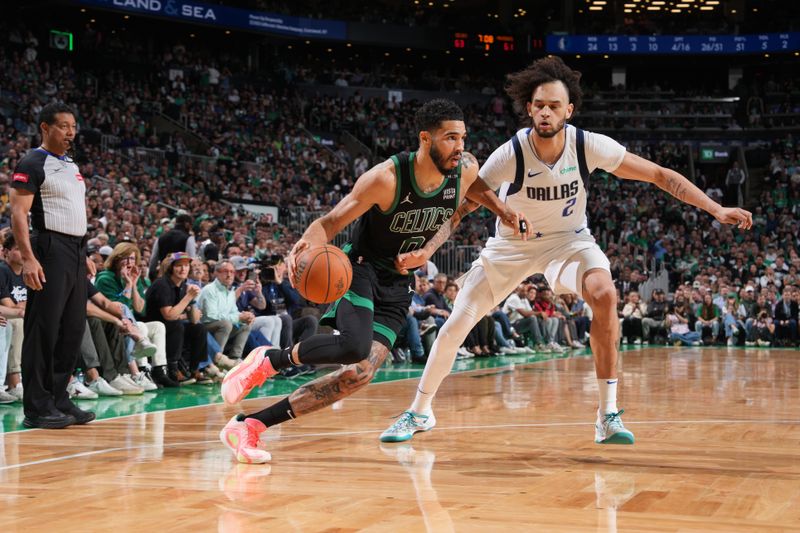 BOSTON, MA - JUNE 9: Jayson Tatum #0 of the Boston Celtics dribbles the ball during the game against the Dallas Mavericks during Game 2 of the 2024 NBA Finals on June 9, 2024 at the TD Garden in Boston, Massachusetts. NOTE TO USER: User expressly acknowledges and agrees that, by downloading and or using this photograph, User is consenting to the terms and conditions of the Getty Images License Agreement. Mandatory Copyright Notice: Copyright 2024 NBAE  (Photo by Jesse D. Garrabrant/NBAE via Getty Images)