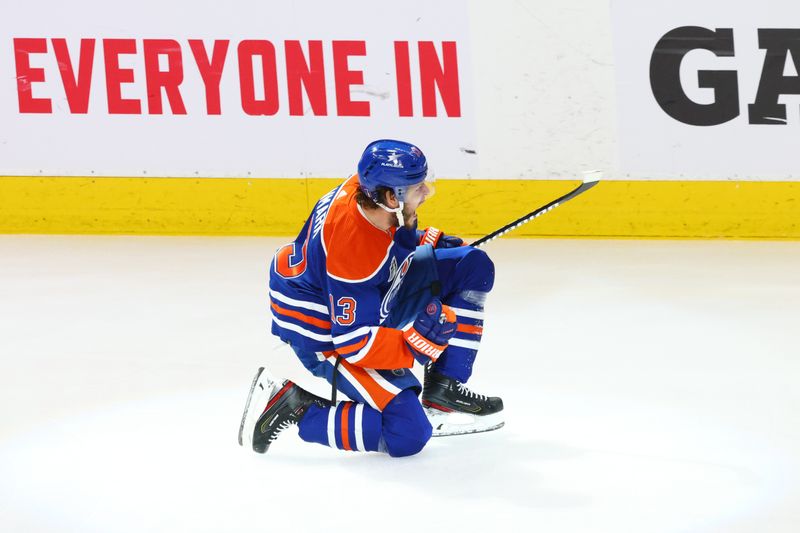 Jun 15, 2024; Edmonton, Alberta, CAN; Edmonton Oilers center Mattias Janmark (13) celebrates a goal in the first period against the Florida Panthers n game four of the 2024 Stanley Cup Final at Rogers Place. Mandatory Credit: Sergei Belski-USA TODAY Sports