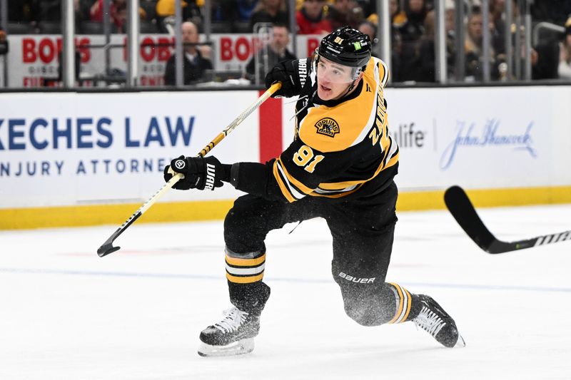 Dec 3, 2024; Boston, Massachusetts, USA; Boston Bruins defenseman Nikita Zadorov (91) shoots and scores against the Detroit Red Wings during the first period at the TD Garden. Mandatory Credit: Brian Fluharty-Imagn Images