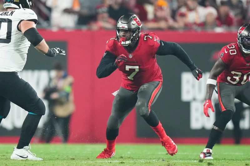 Tampa Bay Buccaneers linebacker Shaquil Barrett (7) rushes the passer during an NFL football game against the Jacksonville Jaguars, Sunday, Dec. 24, 2023, in Tampa, Fla. (AP Photo/Peter Joneleit)