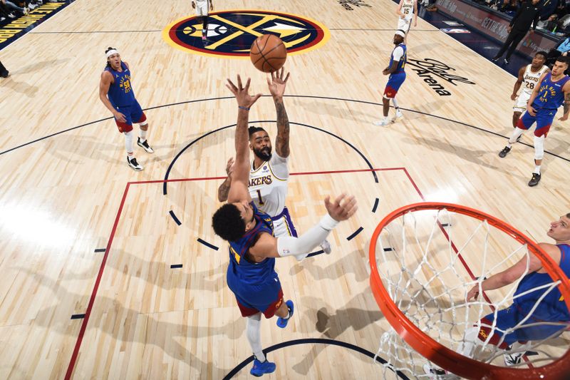 DENVER, CO - APRIL 20: D'Angelo Russell #1 of the Los Angeles Lakers drives to the basket during the game against the Denver Nuggets during Round 1 Game 1 of the 2024 NBA Playoffs on April 20, 2024 at the Ball Arena in Denver, Colorado. NOTE TO USER: User expressly acknowledges and agrees that, by downloading and/or using this Photograph, user is consenting to the terms and conditions of the Getty Images License Agreement. Mandatory Copyright Notice: Copyright 2024 NBAE (Photo by Garrett Ellwood/NBAE via Getty Images)