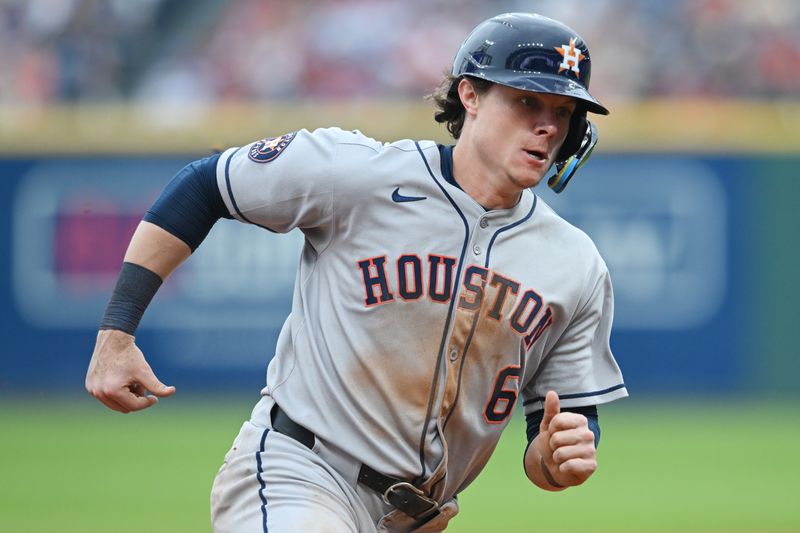 Jun 8, 2025; Cleveland, Ohio, USA; Houston Astros center fielder Jake Meyers (6) rounds third base en route to scoring on a double by right fielder Cam Smith (11) during the seventh inning against the Cleveland Guardians at Progressive Field. Mandatory Credit: Ken Blaze-Imagn Images