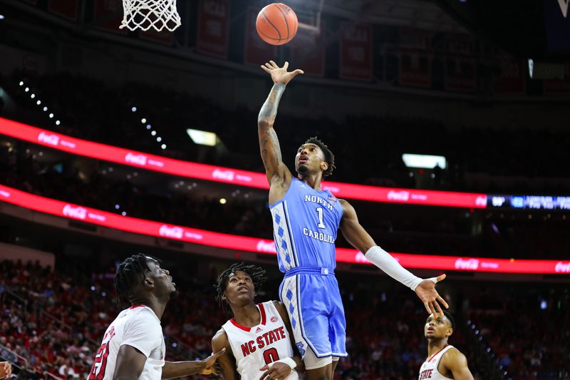 Feb 19, 2023; Raleigh, North Carolina, USA;  North Carolina Tar Heels forward Leaky Black (1) shoots the ball during the second half of the game against North Carolina State Wolfpack at PNC Arena. Mandatory Credit: Jaylynn Nash-USA TODAY Sports