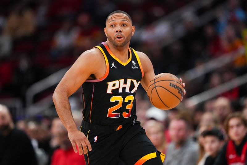 HOUSTON, TEXAS - DECEMBER 27: Eric Gordon #23 of the Phoenix Suns dribbles the ball in the second quarter of the game against the Houston Rockets at Toyota Center on December 27, 2023 in Houston, Texas. User expressly acknowledges and agrees that, by downloading and or using this photograph, User is consenting to the terms and conditions of the Getty Images License Agreement. (Photo by Alex Bierens de Haan/Getty Images)