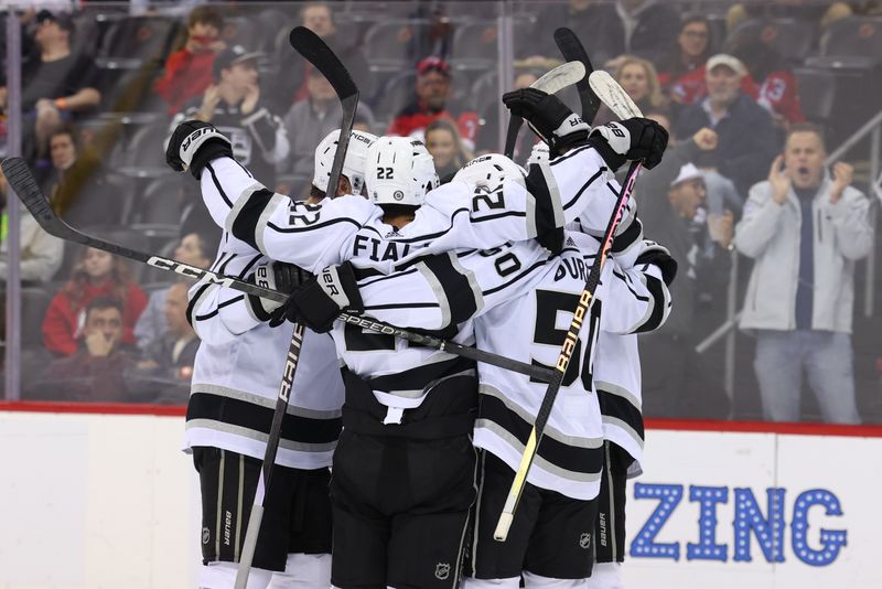 Feb 23, 2023; Newark, New Jersey, USA; Los Angeles Kings defenseman Sean Durzi (50) celebrates his goal against the New Jersey Devils during the third period at Prudential Center. Mandatory Credit: Ed Mulholland-USA TODAY Sports