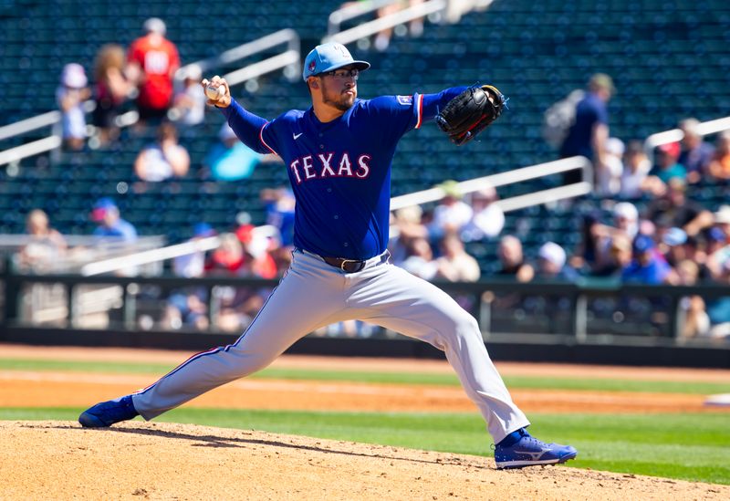 Mar 20, 2024; Goodyear, Arizona, USA; Texas Rangers pitcher Dane Dunning against the Cincinnati Reds during a spring training baseball game at Goodyear Ballpark. Mandatory Credit: Mark J. Rebilas-USA TODAY Sports