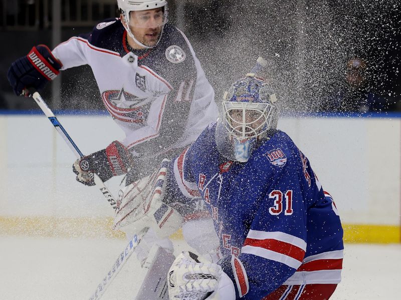 Mar 2, 2026; New York, New York, USA; Columbus Blue Jackets left wing Miles Wood (11) sprays ice onto New York Rangers goaltender Igor Shesterkin (31) during the first period at Madison Square Garden. Mandatory Credit: Brad Penner-Imagn Images