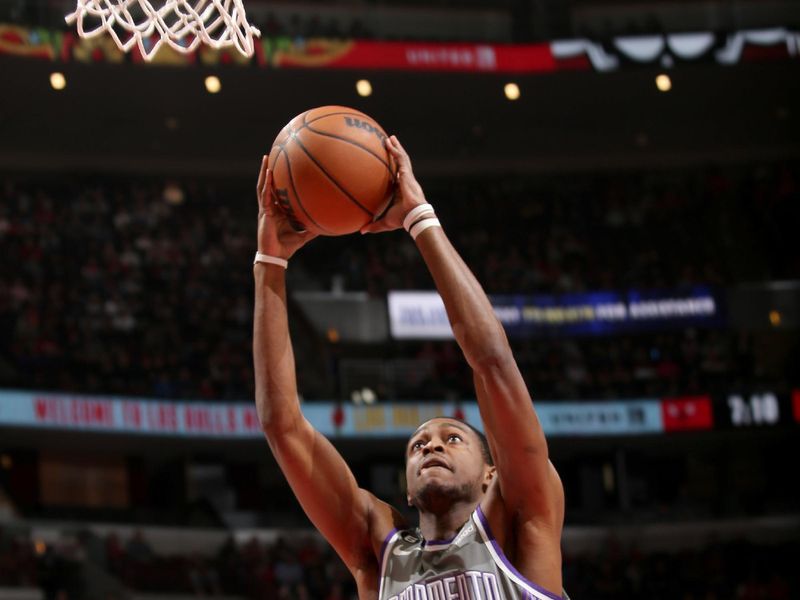 CHICAGO, IL - MARCH 15: De'Aaron Fox #5 of the Sacramento Kings drives to the basket during the game against the Chicago Bulls on March 15, 2023 at United Center in Chicago, Illinois. NOTE TO USER: User expressly acknowledges and agrees that, by downloading and or using this photograph, User is consenting to the terms and conditions of the Getty Images License Agreement. Mandatory Copyright Notice: Copyright 2023 NBAE (Photo by Gary Dineen/NBAE via Getty Images)