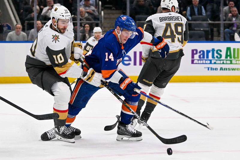 Jan 23, 2024; Elmont, New York, USA;  New York Islanders center Bo Horvat (14) and Vegas Golden Knights center Nicolas Roy (10) battle for a loose puck during the first period at UBS Arena. Mandatory Credit: Dennis Schneidler-USA TODAY Sports