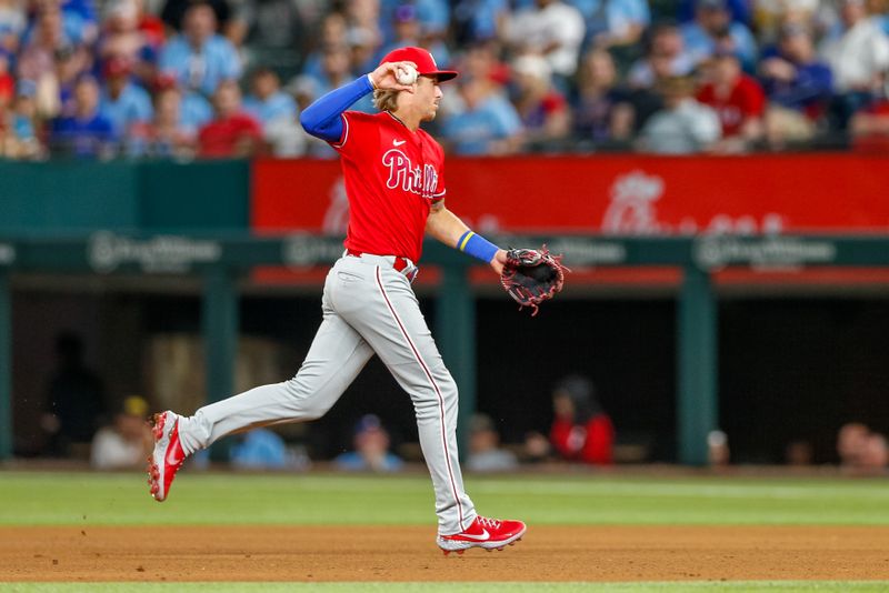 Apr 2, 2023; Arlington, Texas, USA; Philadelphia Phillies second baseman Bryson Stott (5) throws to first during the fourth inning against the Texas Rangers at Globe Life Field. Mandatory Credit: Andrew Dieb-USA TODAY Sports